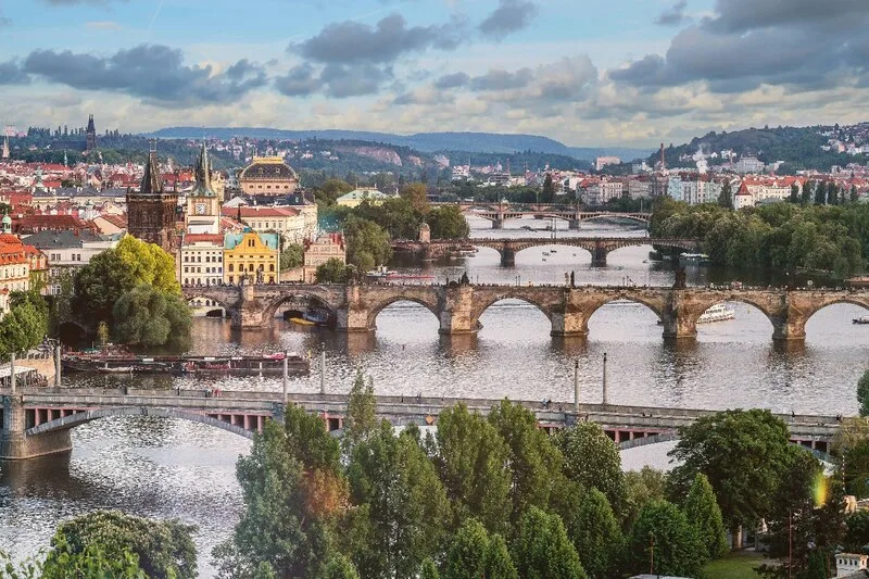 Vibrant view of Prague bridges, enriching Czech language immersion with cultural depth