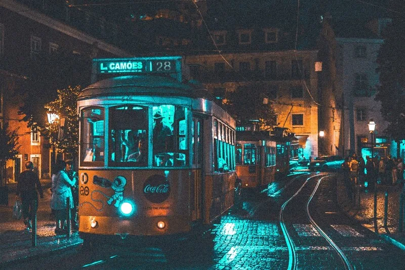 Nighttime tram ride in Lisbon, capturing Portuguese culture during language immersion